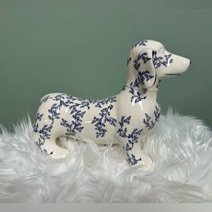 Dachshund figurine with blue flowers